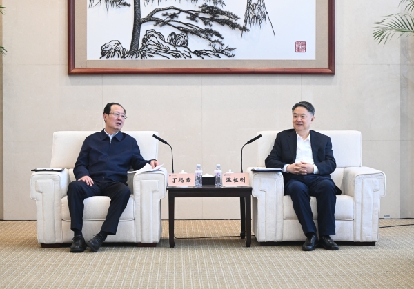 丁焰章與中國華能董事長、黨組書記溫樞剛會談